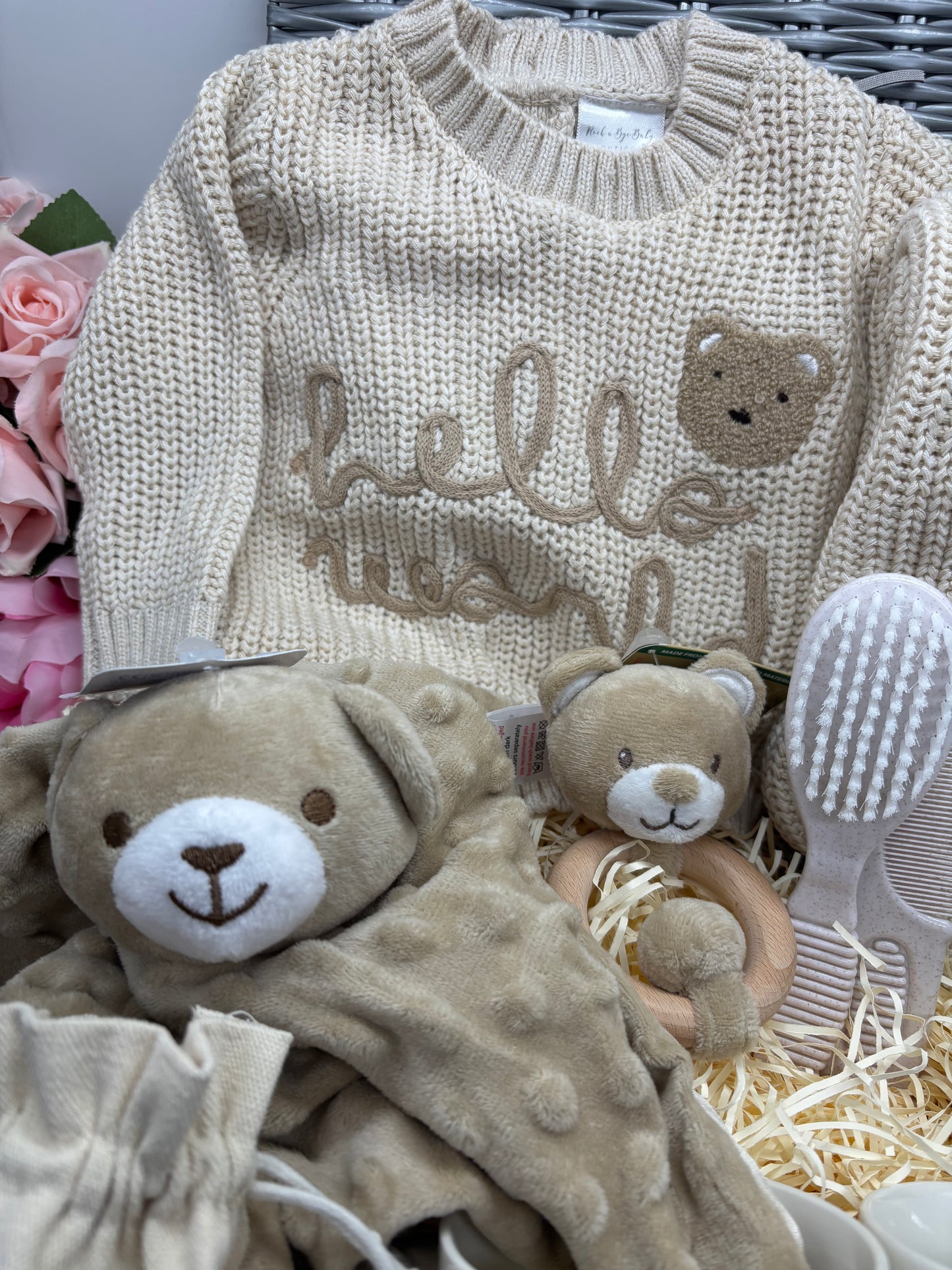 Cream Hello World teddy knitted baby jumper with a teddy comforter and ring rattle