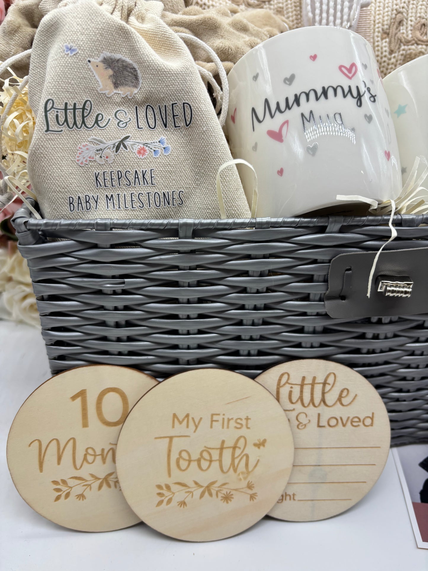Keepsake milestone pouch, Mummy's Mug and My First Tooth milestone discs in the neutral hamper
