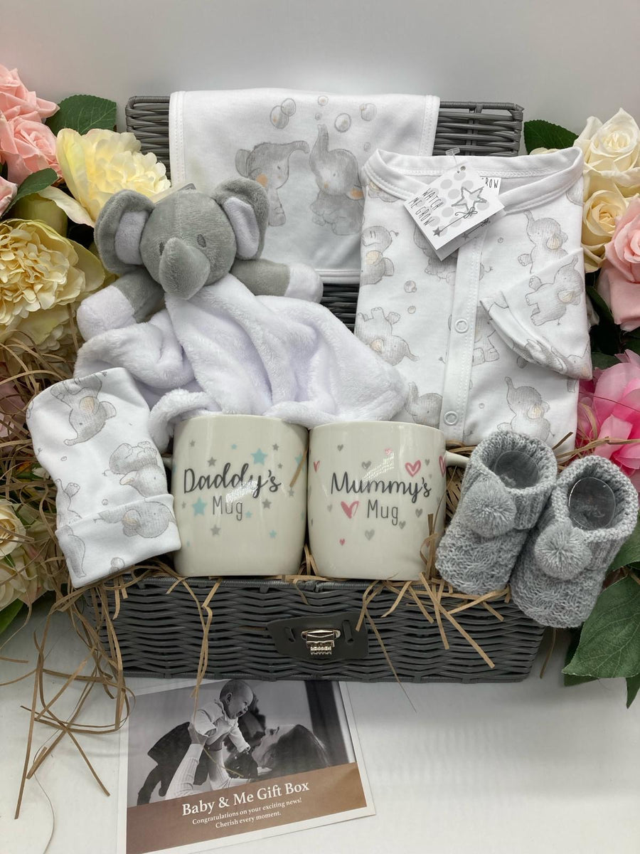 Elephant baby gift box with elephant comforter, newborn clothes, blanket, baby booties and parent mugs