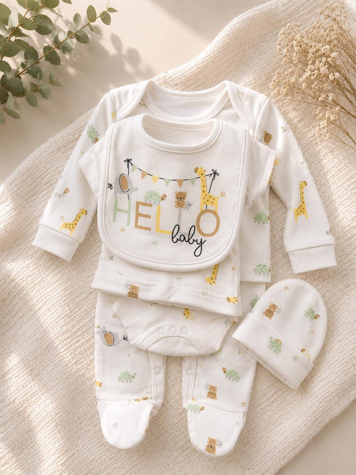 Newborn outfit set included in the luxury baby shower gift hamper